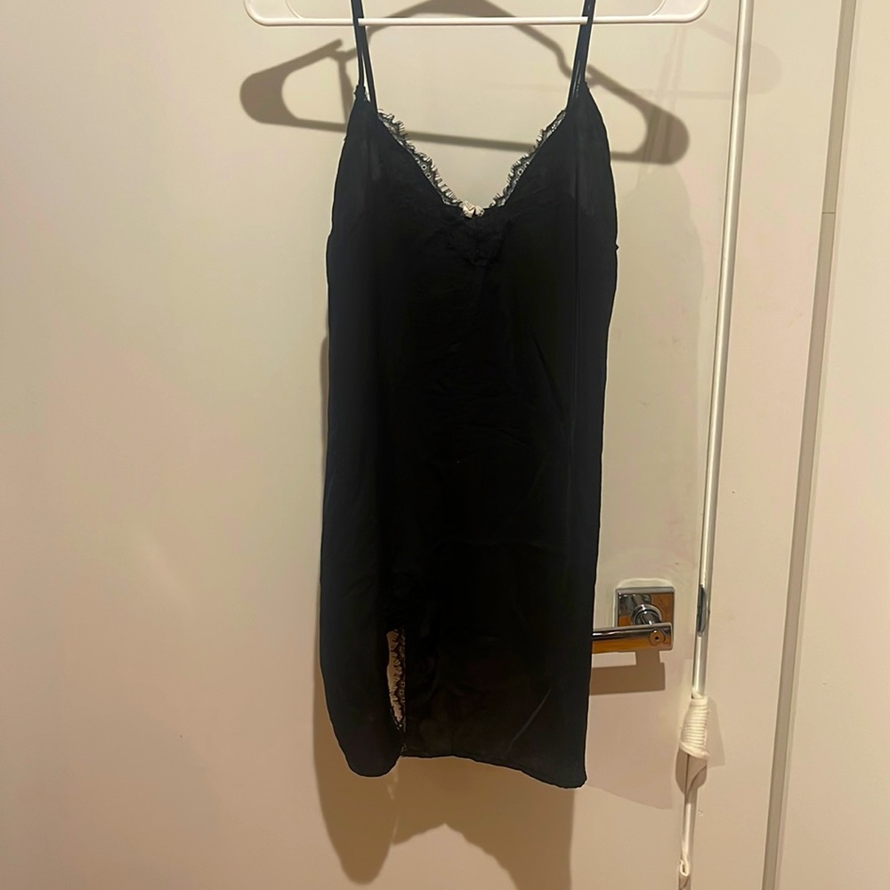 Our from under black slip top